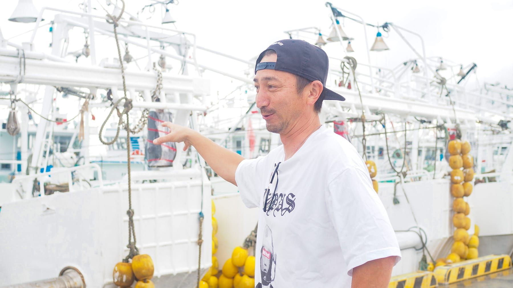 沖合底びき網漁船「清昭丸」の船主・菊地基文さんの写真